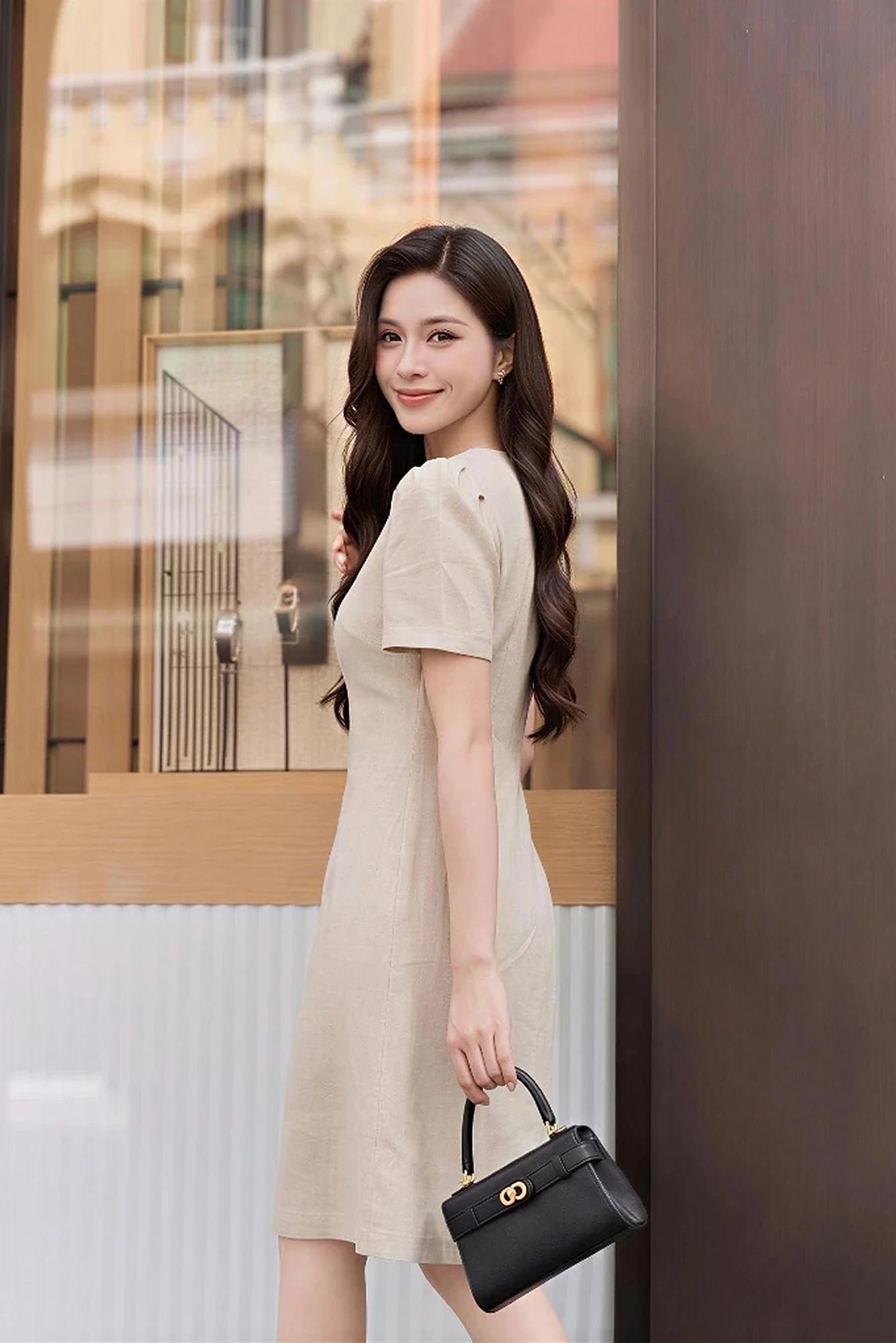 Đầm nữ thiết kế dáng xoè nhẹ, cổ nơ đính cúc nữ tính – ảnh 2