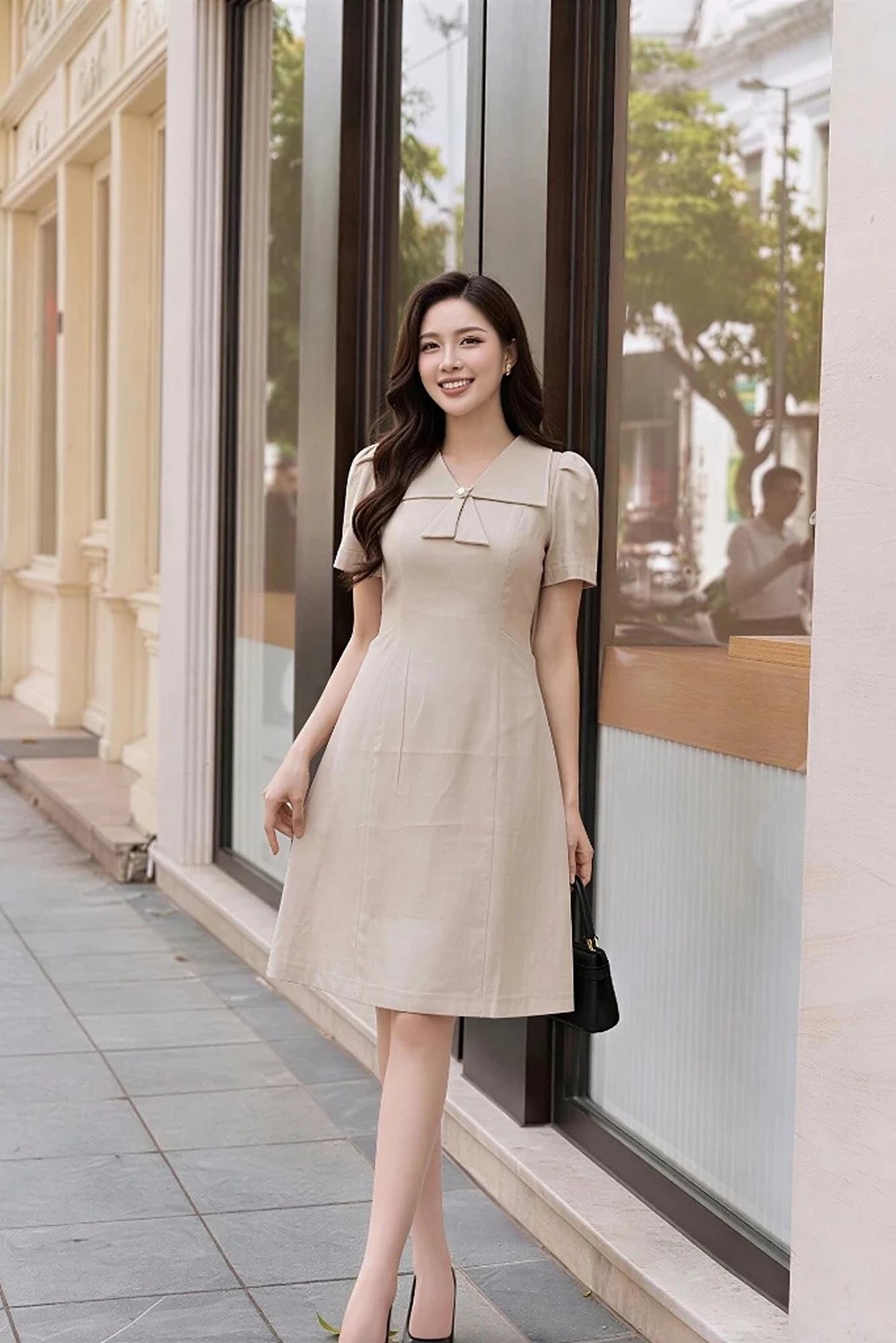 Đầm nữ thiết kế dáng xoè nhẹ, cổ nơ đính cúc nữ tính – ảnh 4