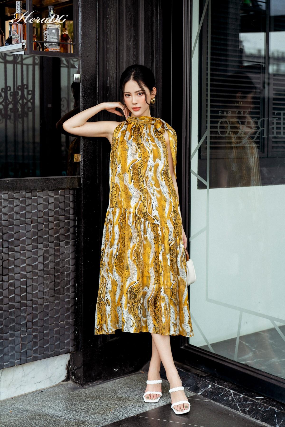 Đầm xòe sát nách, thắt nơ cổ