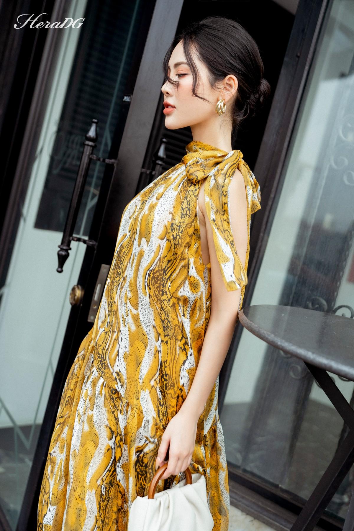 Đầm xòe sát nách, thắt nơ cổ