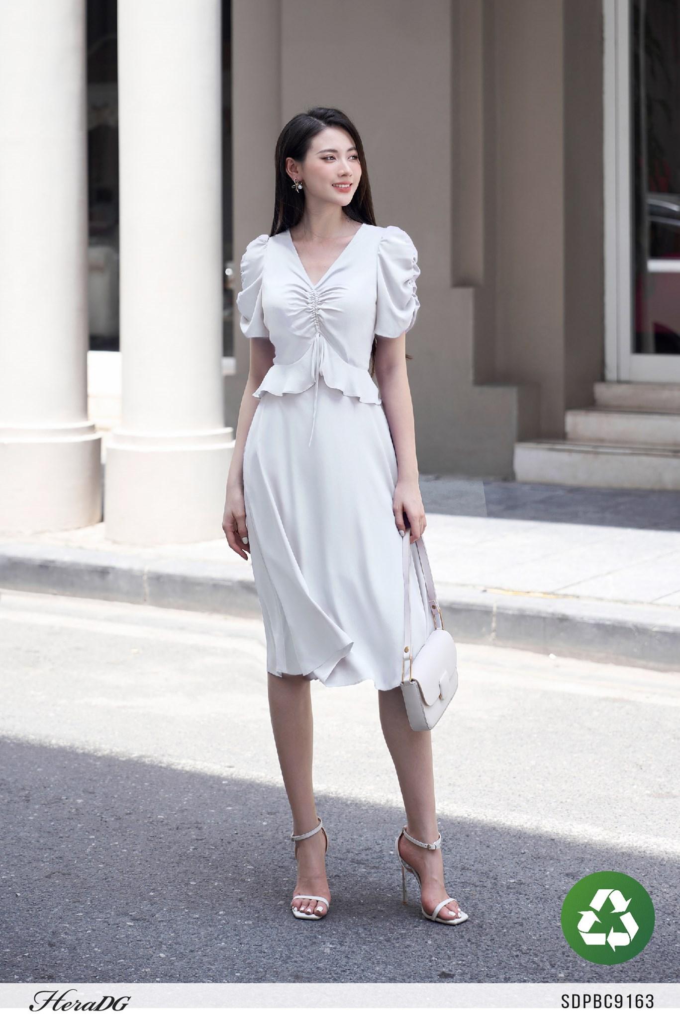 Đầm xoè rút nhún ngực