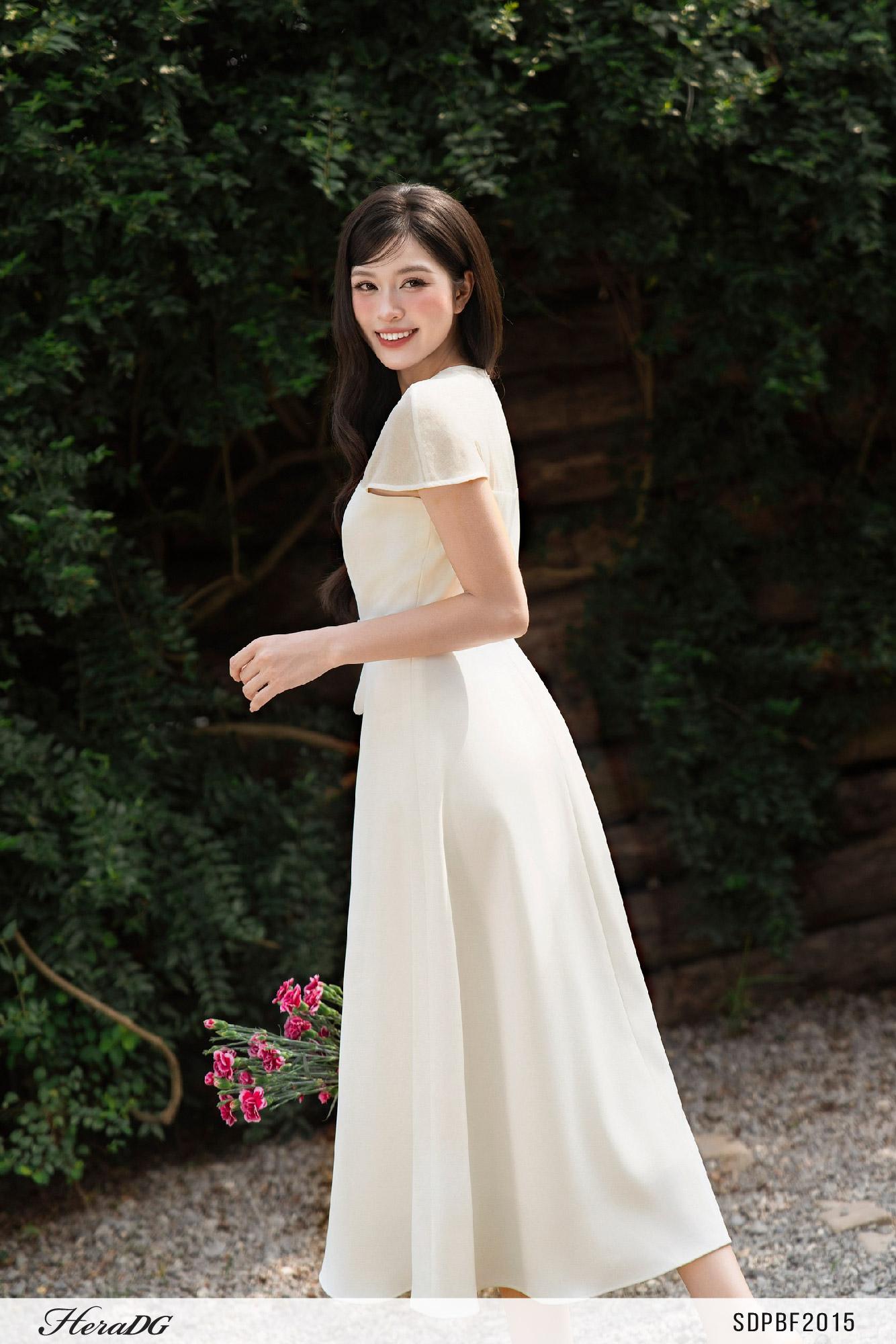 Đầm xòe phối tơ đính hoa nổi