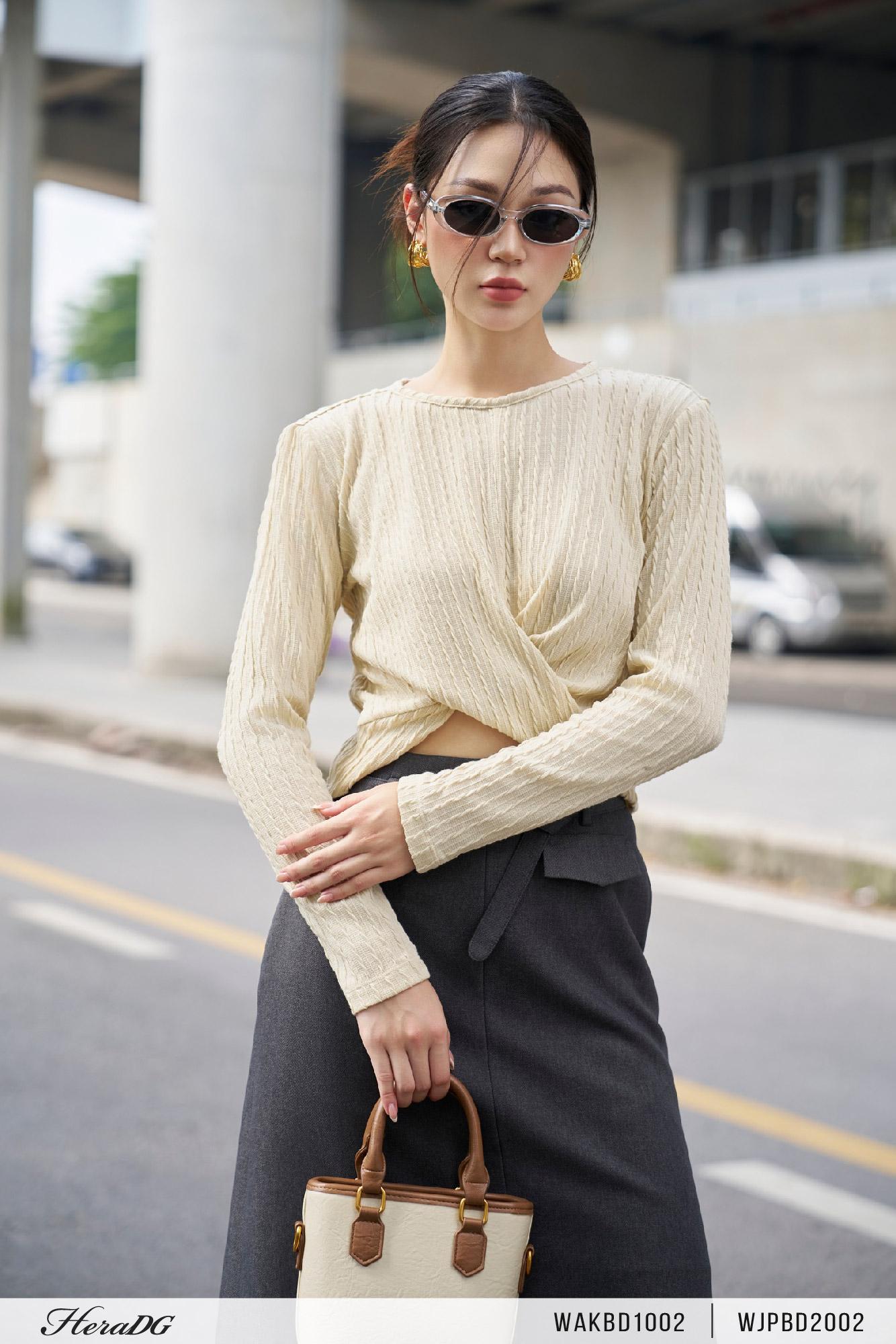 Áo len vặn eo