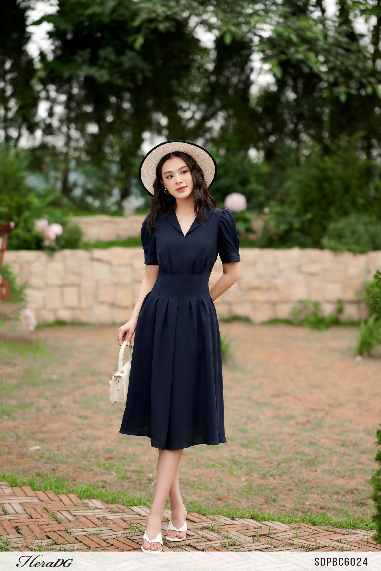 Đầm xoè chiết ly eo